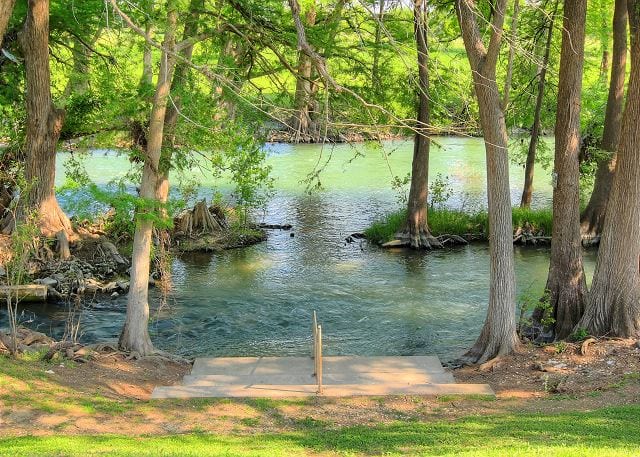 Steps from Waterwheel into Guadalupe River.