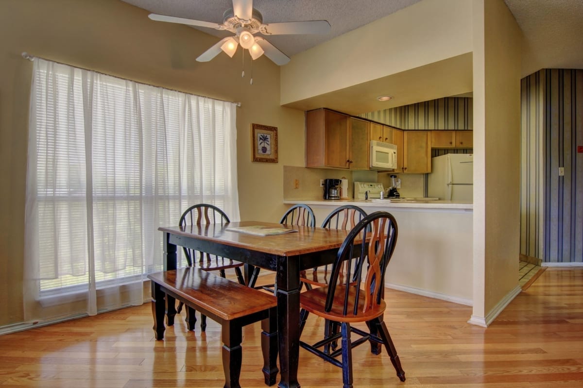 Inverness condo dining table and kitchen.