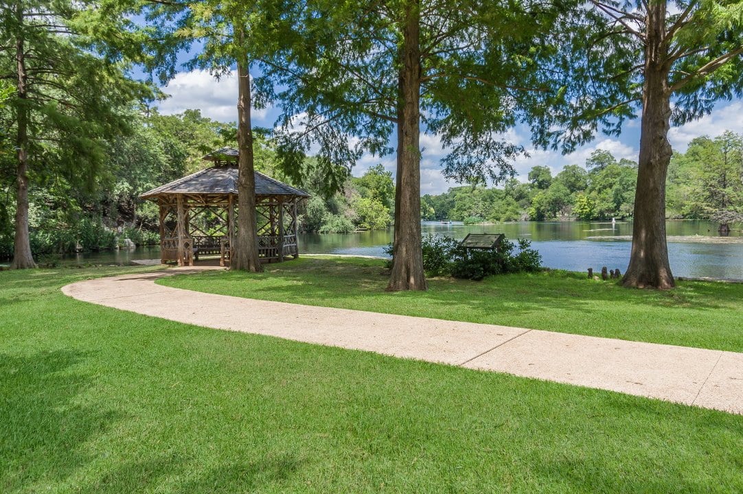 Gazebo sitting next to river in Landa Park, New Braunfels, Texas.