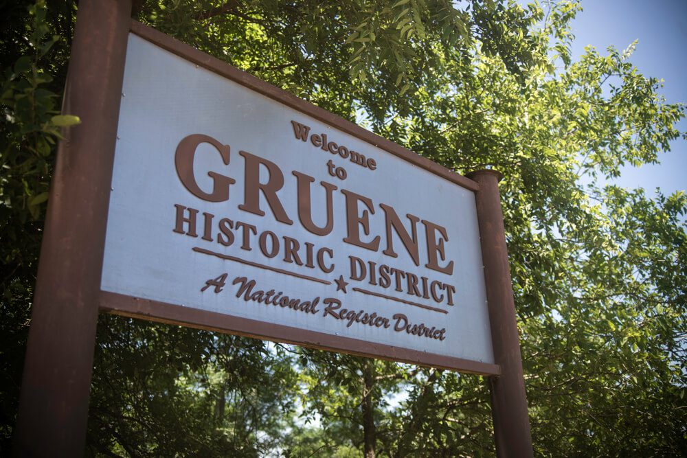 A sign welcomes guests to historic New Braunfels, Texas.