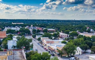 A view from above the city with all of the Things To Do In New Braunfels below.