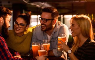 A group of friends enjoying Bars In New Braunfels.